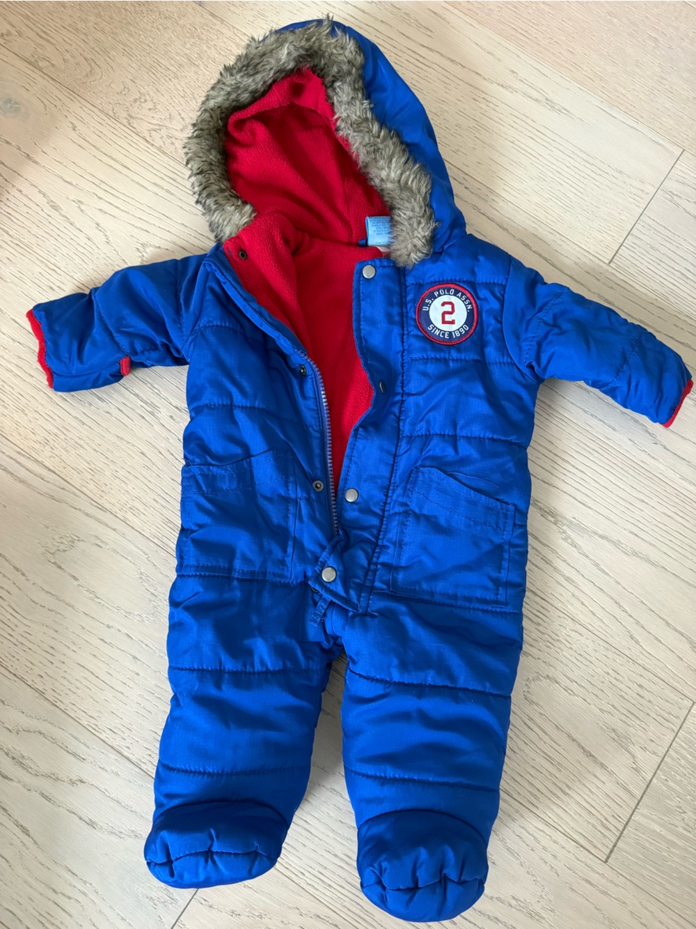 US Polo Royal Blue Padded Infant Snowsuit with Red Lining and Faux-Fur Hood